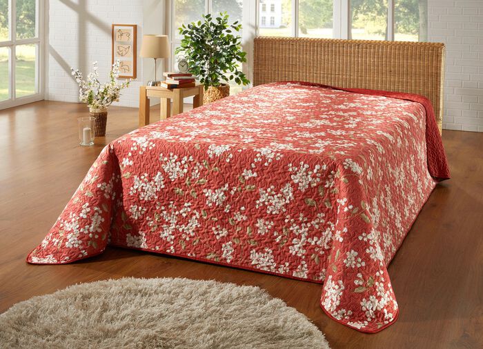 Beddensprei met wolkstiksel aan &eacute;&eacute;n kant 