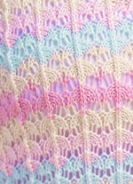 Trui met opengewerkt patroon in strependessin 