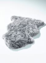 Mat van echte lamsvacht in dierenvorm 