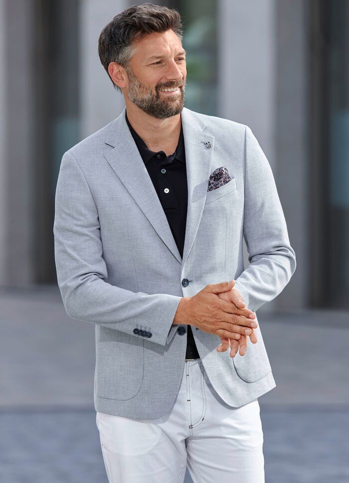 Jas met opgestikte zakken 