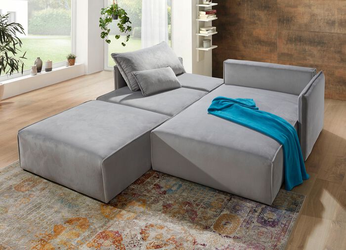 Gestoffeerde zithoek met slaapfunctie 