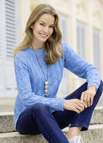 Trui met een langer wordend golfontwerp 