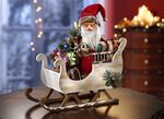 Verlichte kerstman met arreslee 