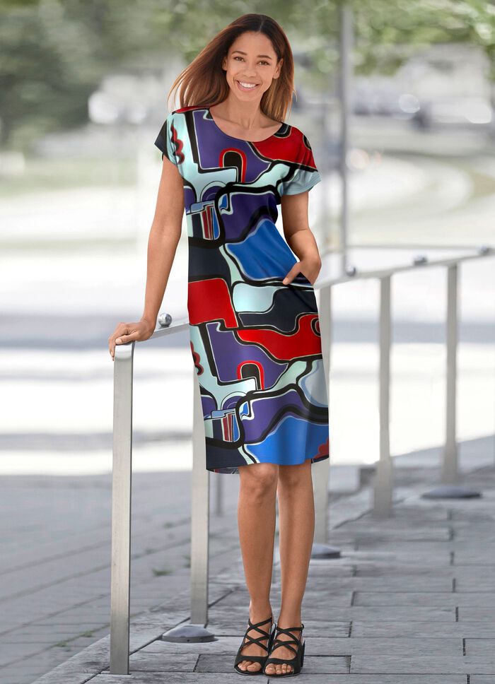 Jurk met zakken in de zijnaad 