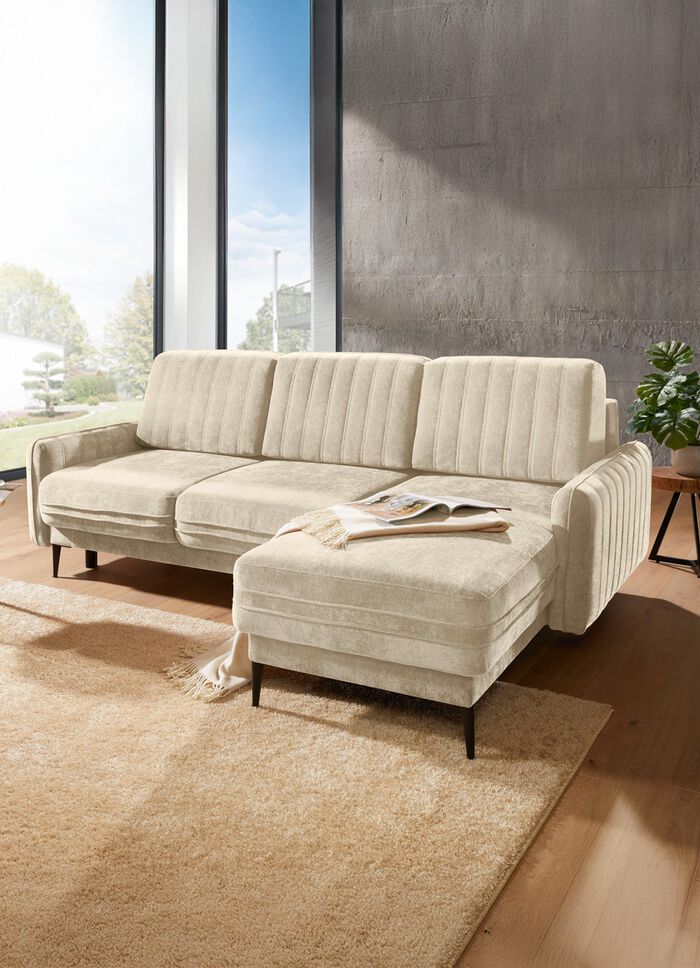 Gestoffeerde hoek met bedfunctie en bedkast 