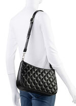 Laurina tas met trendy quilting en decoratieve klinknagels ZWART