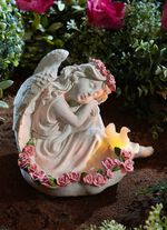 Rozenengel met LED-vogel 