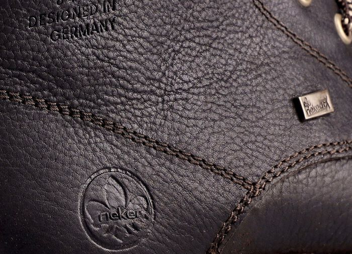 Rieker veterlaars met warme voering van lamsleer en pluche materiaal DONKERBRUIN