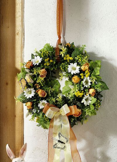 Muurkrans met vlinder 