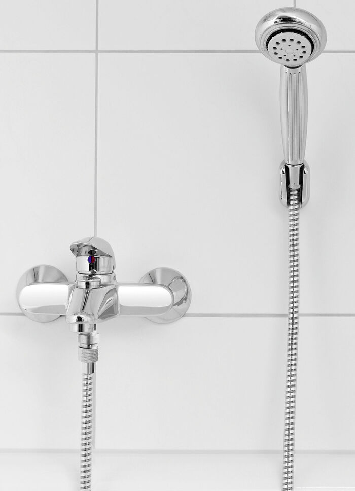 Waterbesparende douchekop en waterbespaarder 