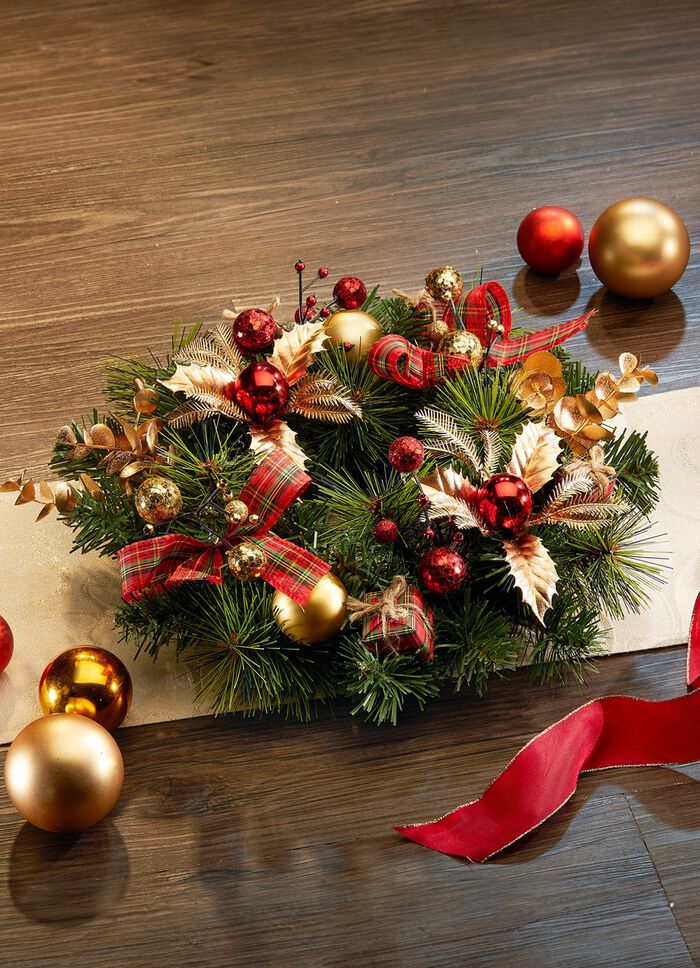 Rijkelijk vormgegeven tafelkrans 