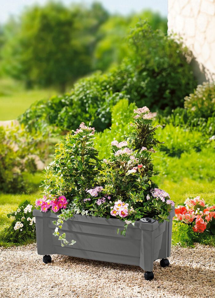 Plantenbak op wielen met peil voor waterstand 