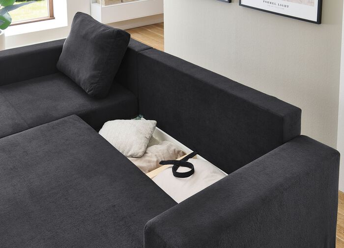 Gestoffeerde hoek met bedfunctie en bedkast 