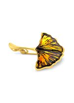 Pin kan ook als hanger gedragen worden 