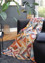 Dekentje met een mooie gehaakte zoom 