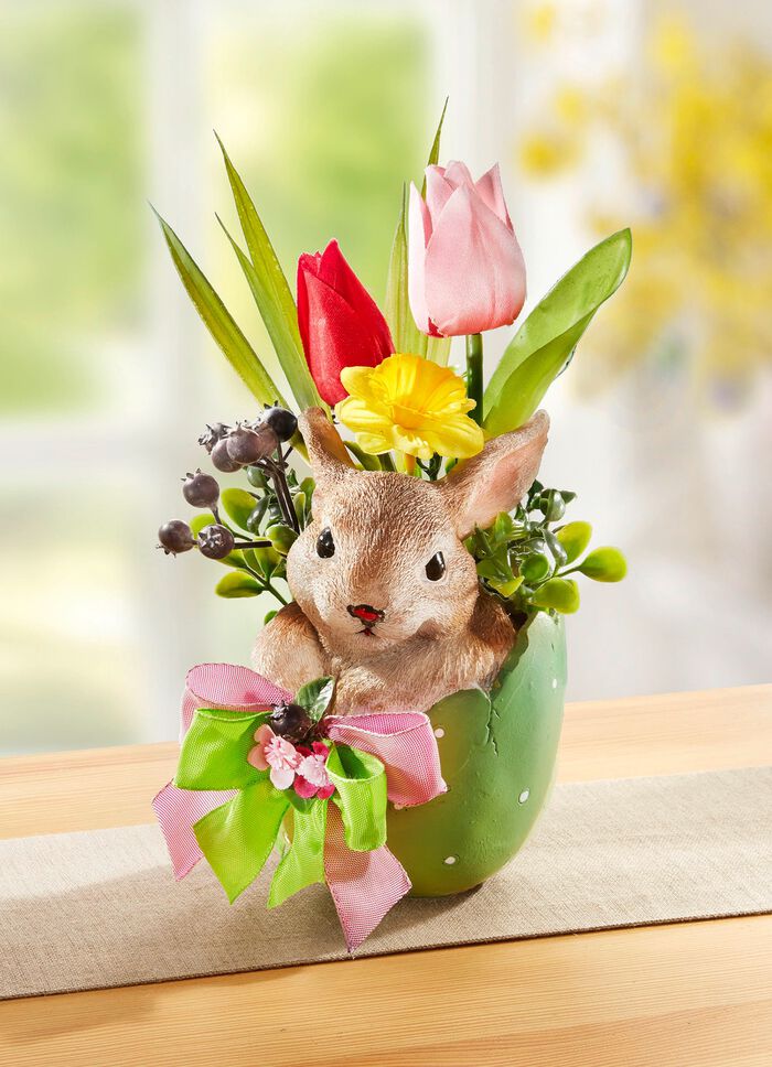 Tulpenarrangement in een eiervaas 