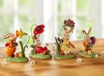 Konijnen met lentebloemen gemaakt van fijn steengoed GROEN-ROOD