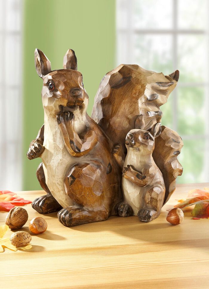 Eekhoornfamilie in gesneden houtlook 