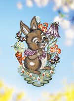 Raamdecoratie 'Haasje met wortel', van kantwerk uit Plauen 