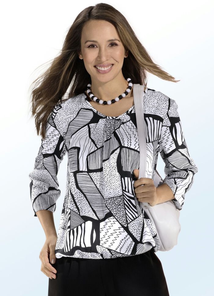 Tuniek met leuke plooitjes aan de halslijn 