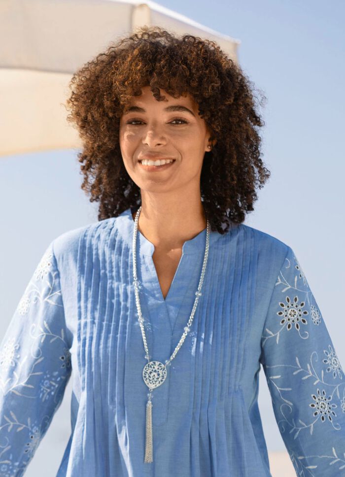 Halsketting met hanger en kwastje 