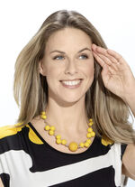 Trendy ketting van 2 rijen met gele bolletjes 