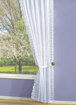 Overgordijnenset met geborduurde boord aan beide zijden 