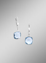 Mooie oorbellen met beh. blauwe topaas 
