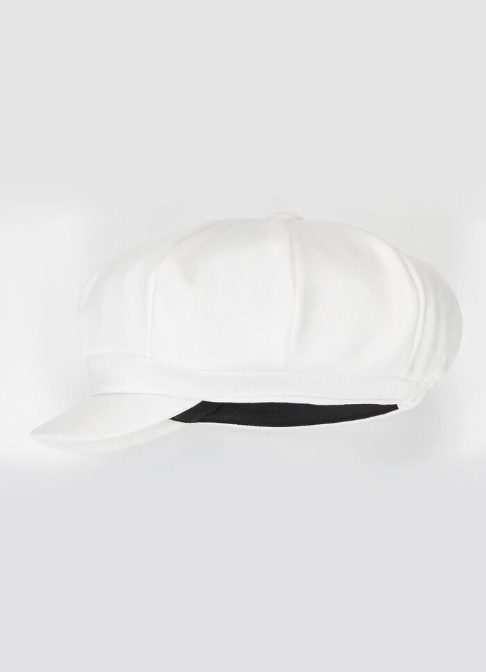 Elegante dames krantenjongenspet met elastiek aan de achterkant 