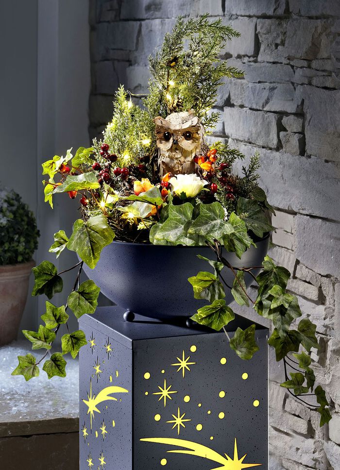 Verlichte krans met uil 