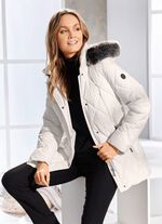 Jas met ritssluiting bij de zijsplitten 