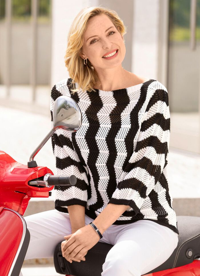 Trui met uitlopend golvend patroon 