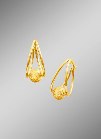 Creoolse oorbellen met machinaal gegraveerde kogel 