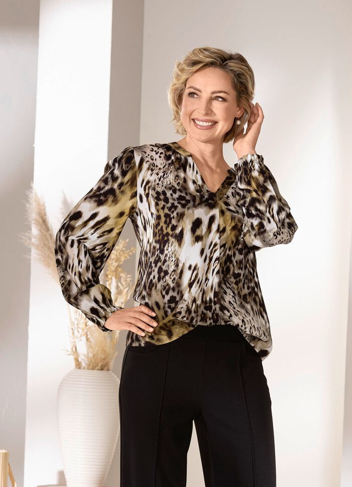 tuniek met gesmokte randen 