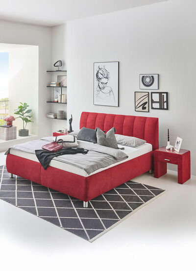 Een heerlijk comfortabel gestoffeerd bed 