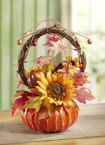 Stijlvol, herfstachtig pompoenarrangement 