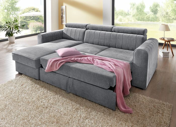 Gestoffeerde hoekeenheid met bedfunctie 