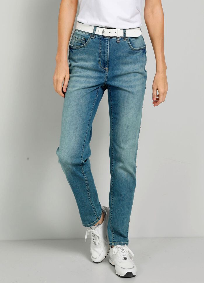 Jeans met studs langs de zijnaad 