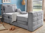 Boxspringbed met elektrisch uitschuifbare tv-beugel 