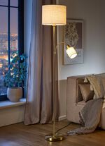 Staande lamp met lampenkap van structuurstof 