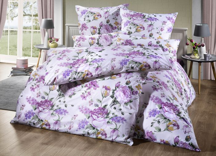 Beddengoedset met rozenmotieven 