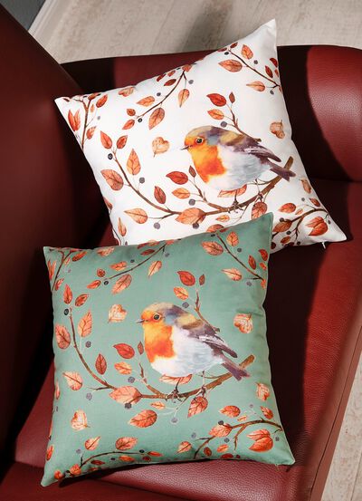 Kussenhoes met vogel op tak motief 