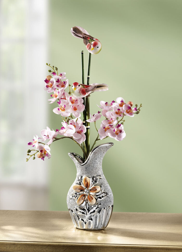 Orchidee arrangement van kunstmateriaal in een vaas 