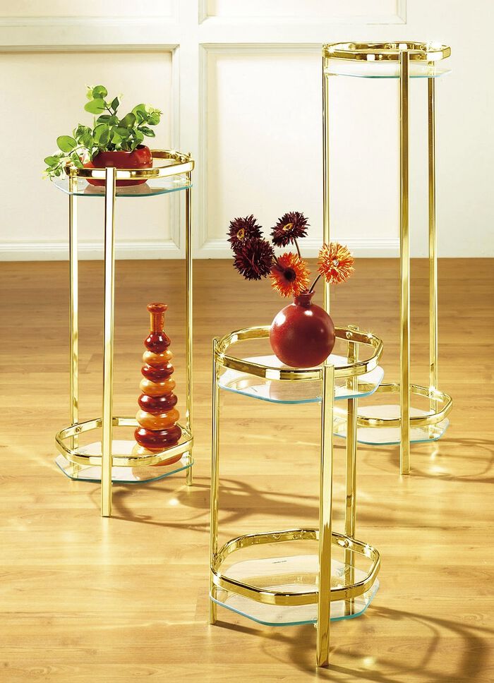 Elegante bloemenzuil van messingkleurige stalen buis 