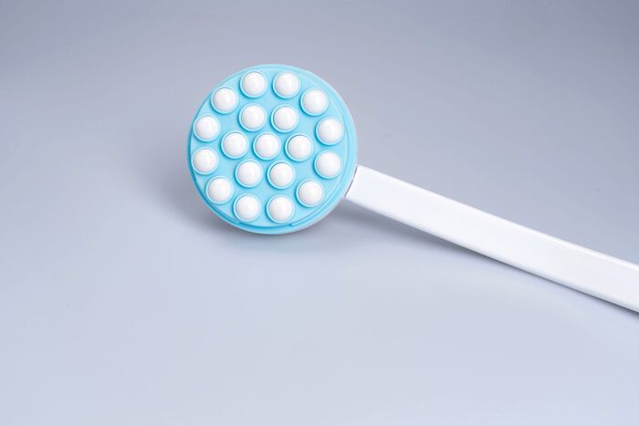 Rugcreamer met ge&iuml;ntegreerde rollen 