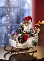 Verlichte kerstman met arreslee 