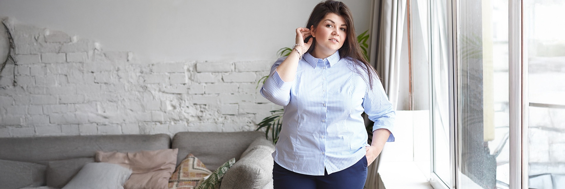 Brede heupen eenvoudig camoufleren met de juiste mode
